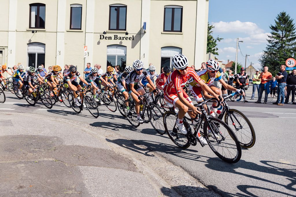 Chasing peloton with one lap to go.