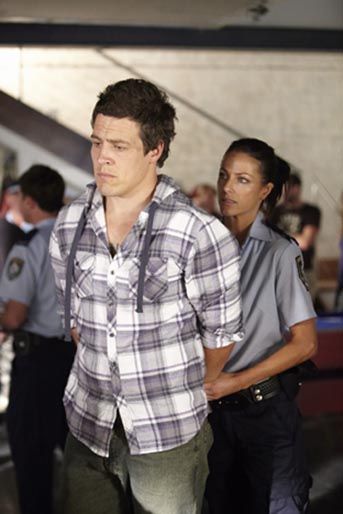 Charlie handcuffs Brax - and not for fun