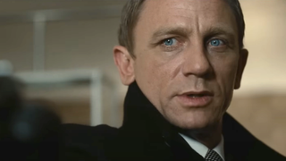 daniel craig looking at the camera in a tie and jacket in quantum of solace