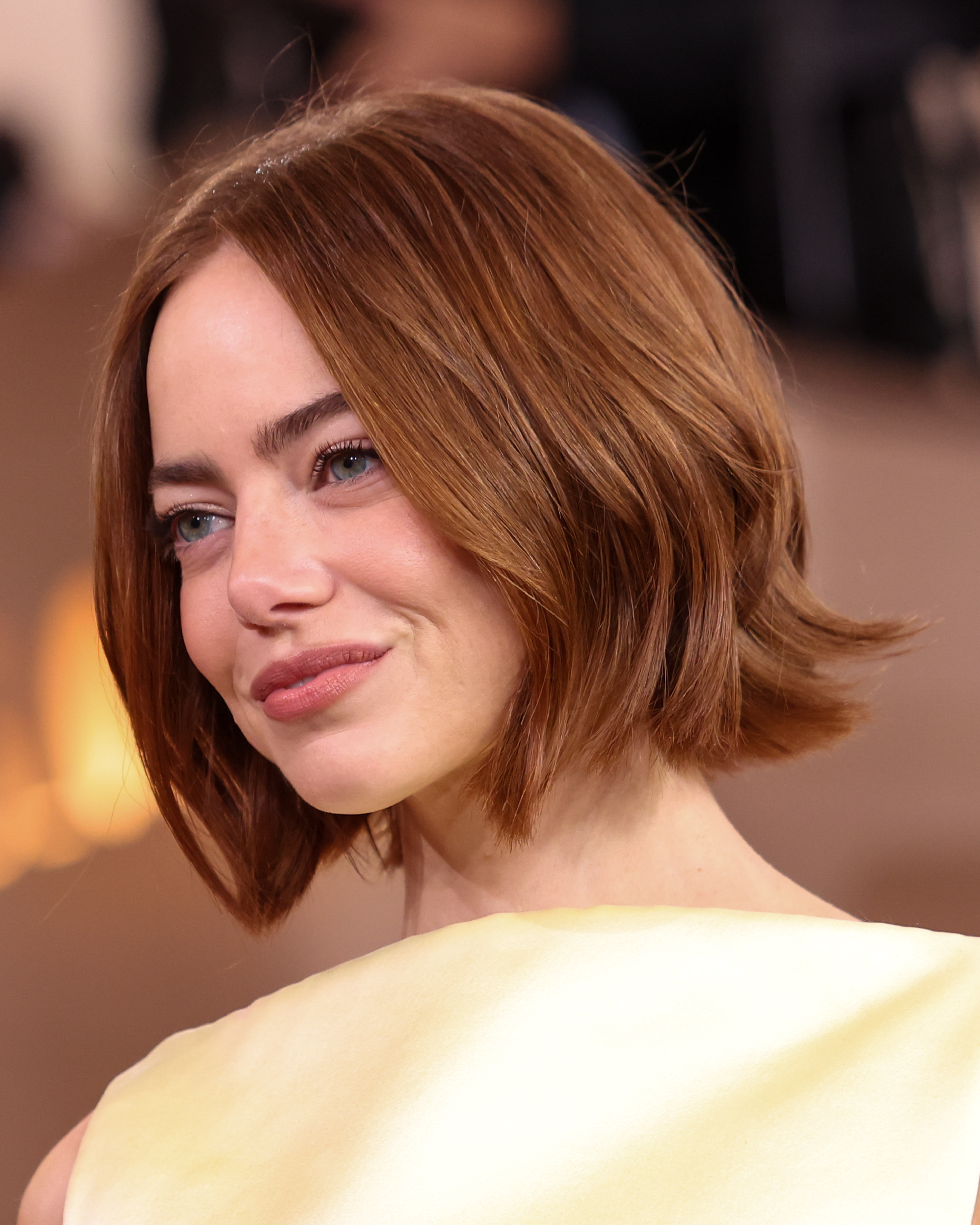 Emma Stone walks the red carpet of the 83rd Annual Golden Globes