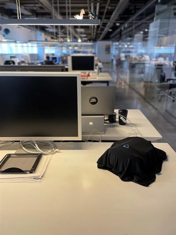 Unrelease Vive VR headset under a black sheet in an office