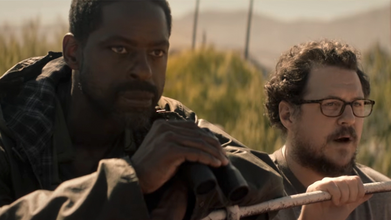 Sterling K. Brown and Cameron Britton looking off into the distance in Paradise