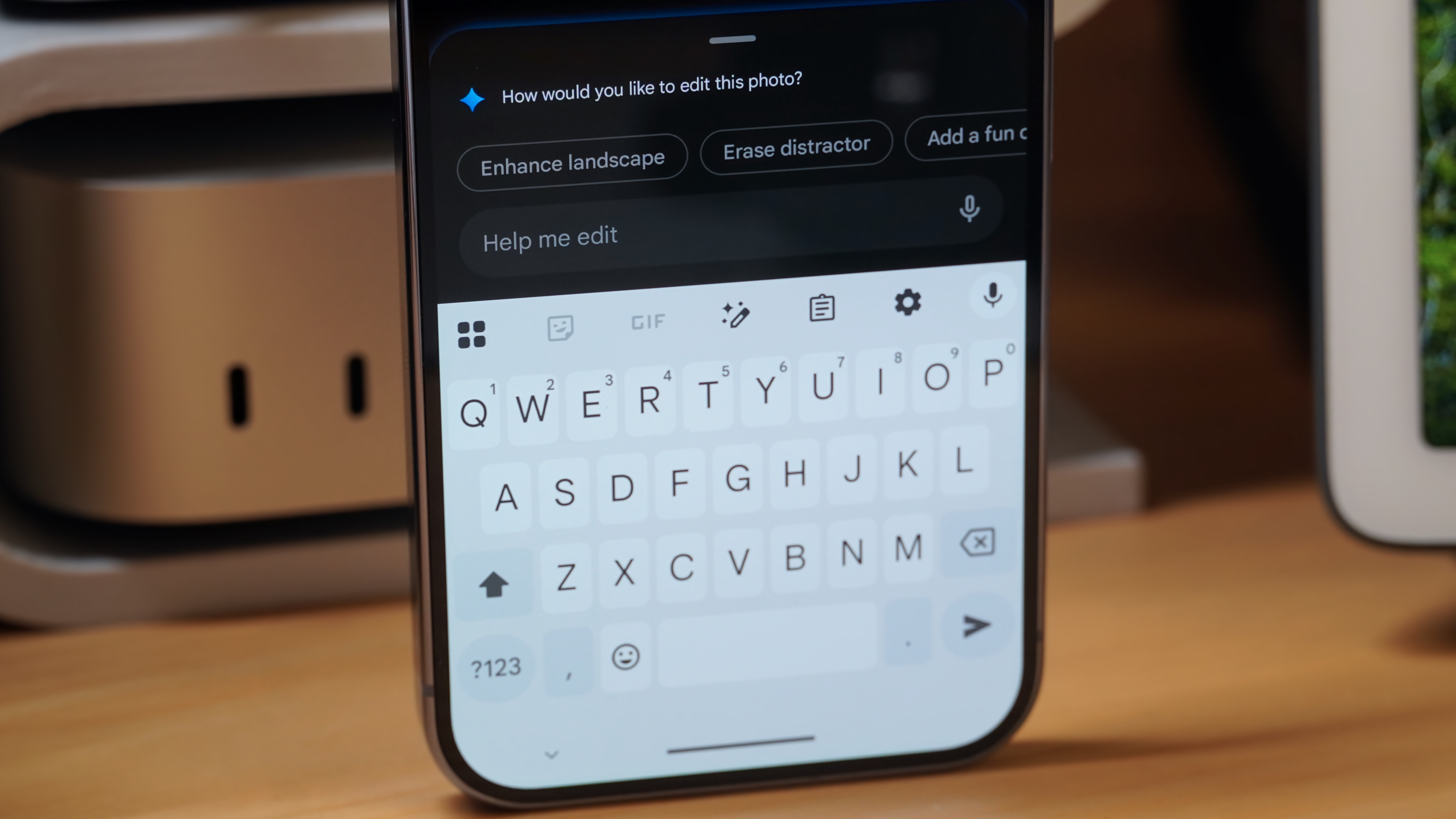 The keyboard and suggestions for the Ask Photos feature in Google Photos on a Pixel 10 Pro.