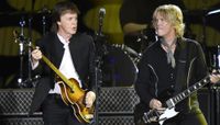 Paul McCartney (left) and Brian Ray perform onstage at the Desert Trip festival in Indio, California on October 8, 2016