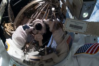 NASA astronaut Jessica Meir pauses to take a selfie during her historic first all-woman spacewalk together with Christina Koch on Oct. 18. In the reflection on her spacesuit visor, you can see parts of the International Space Station's exterior and planet Earth.