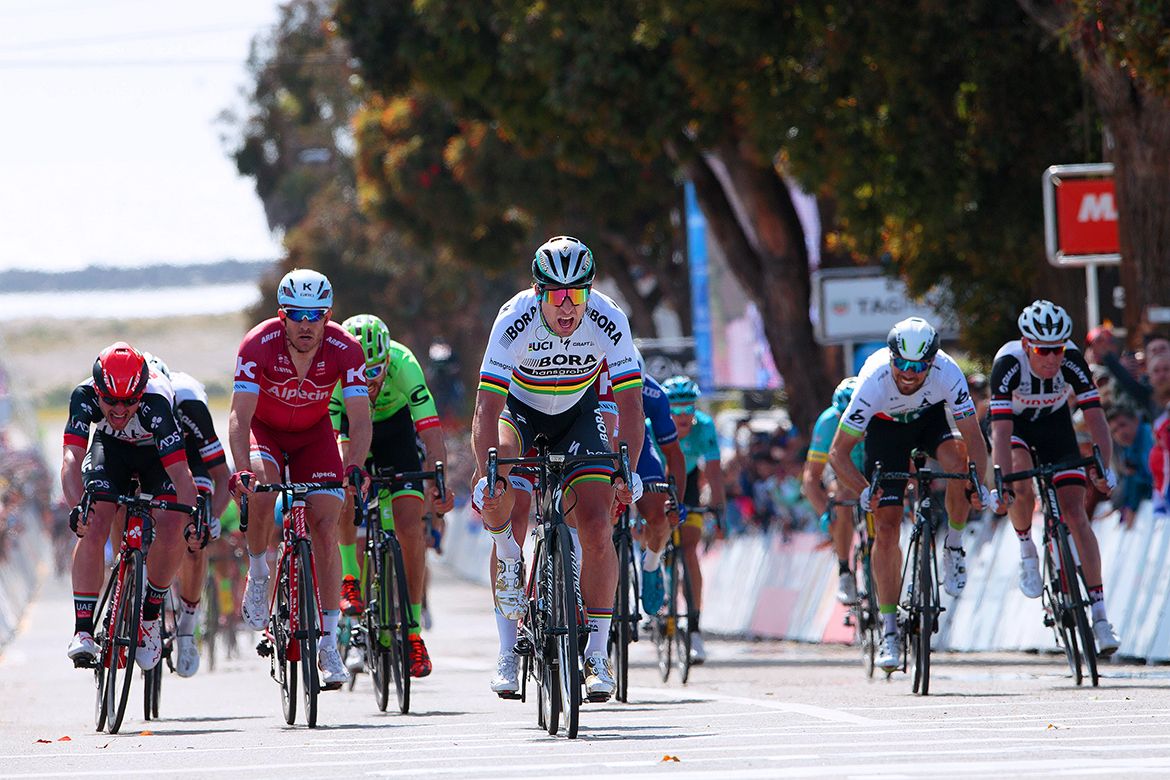The top riders pass the line