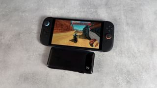 Anker 20,000mAh 87W power bank next to the Nintendo Switch 2 with Mario Kart World on-screen