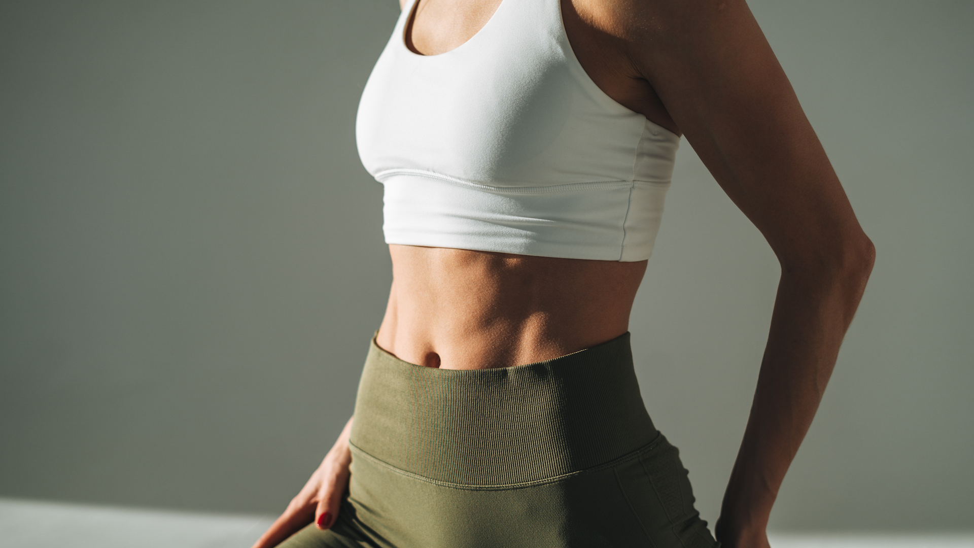 Woman showing midriff in activewear