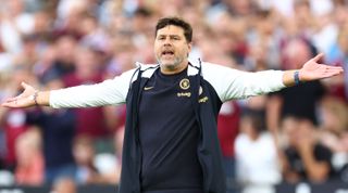 Chelsea head coach Mauricio Pochettino reacts with his arms outstretched during a match