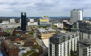 View of the Birmingham city skyline with the new library design