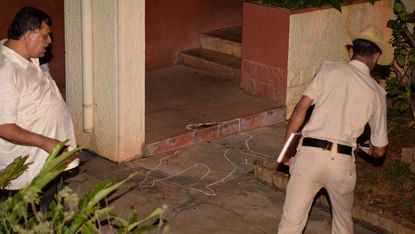 The scene outside the Bangalore home of slain journalist Gauri Lankesh