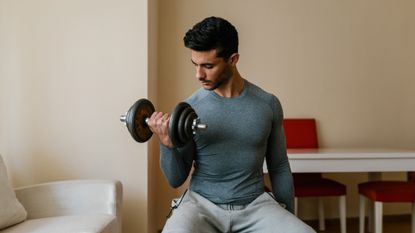 Man doing bicep curls