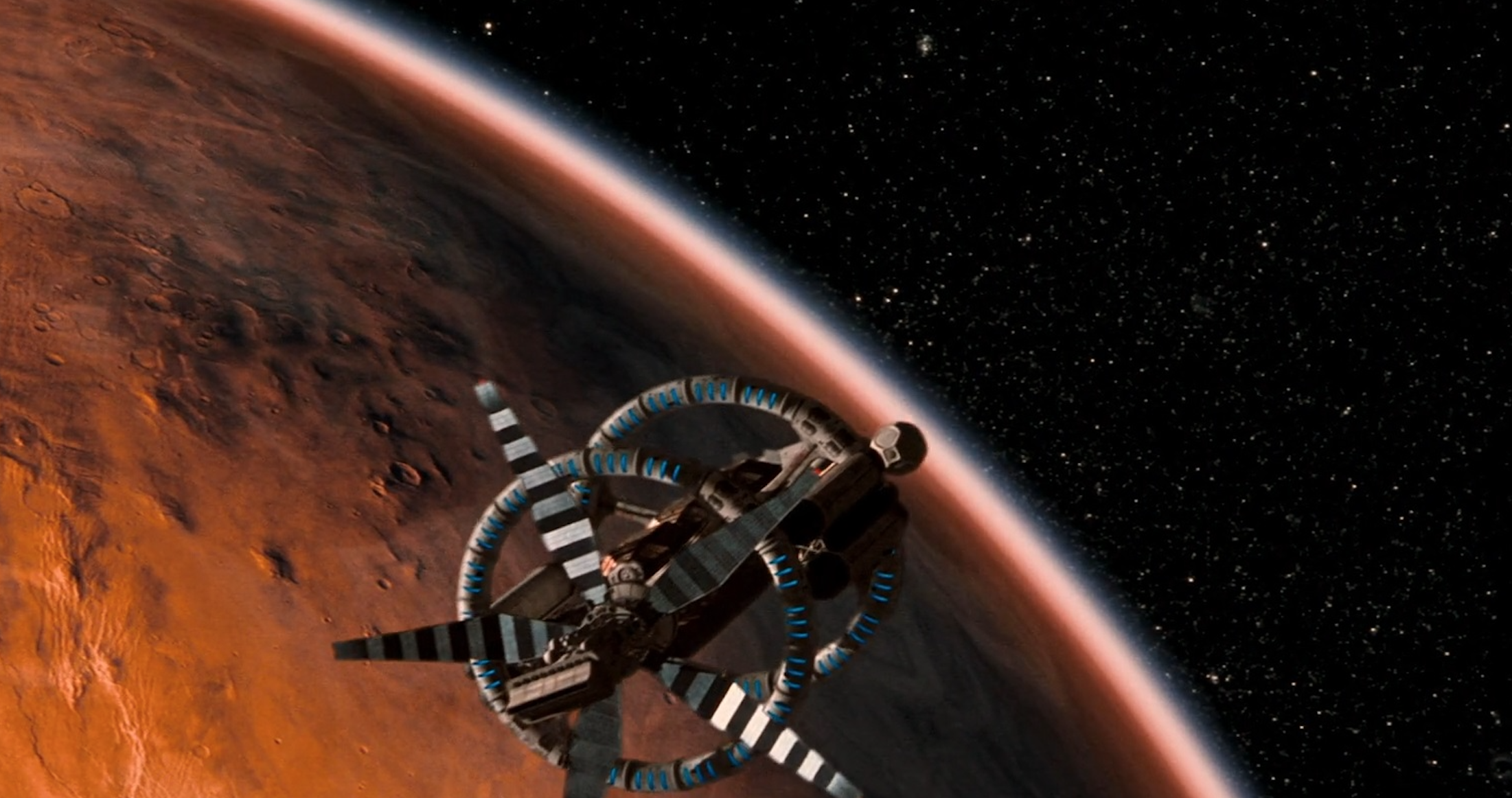 A spaceship enters orbit around the planet Mars