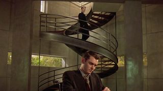 The double-helix staircase is just one detail we love in this epic move by writer and director Andrew Niccol