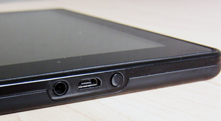 Bottom (Left to Right): Headphone jack, microUSB port, power button