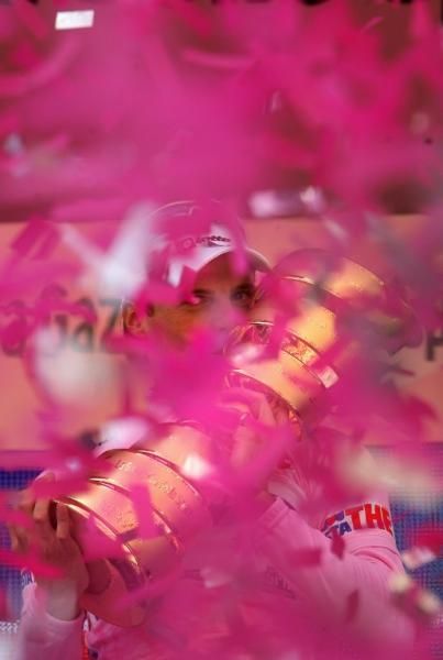 2007 Giro champion Danilo Di Luca in a sea of pink confetti.