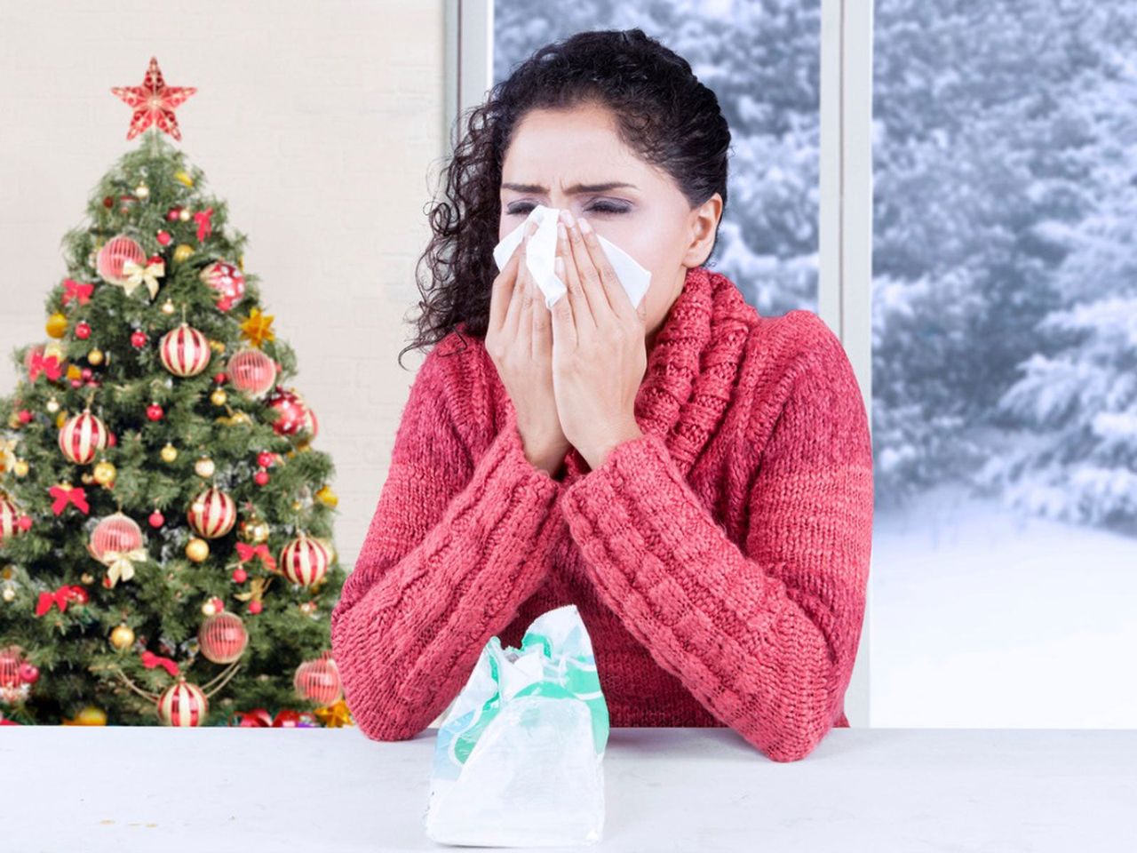 Person Sneezing Next To Christmas Tree