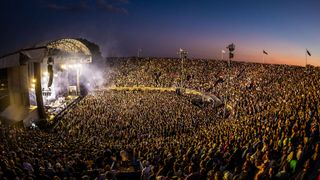 L-Acoustics KS28 subs topped with Kara II front-fills line the face of the stage at NYC’s Forest Hills Stadium.