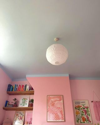 Pink walls with white paper lampshade