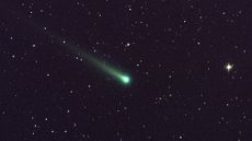 Some comets appear to glow green when ultraviolet sunlight vaporizes carbon molecules in the comet's head 