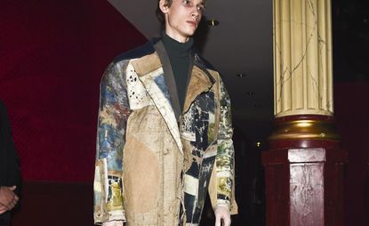 Male model wearing textured coat