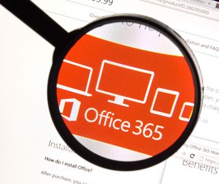 Office 365 logo being viewed through a magnifying glass