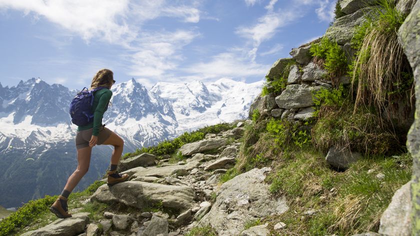 A woman hiking in the mountains