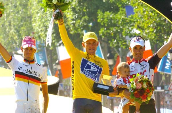 The 2004 Tour podium with Armstrong and Basso