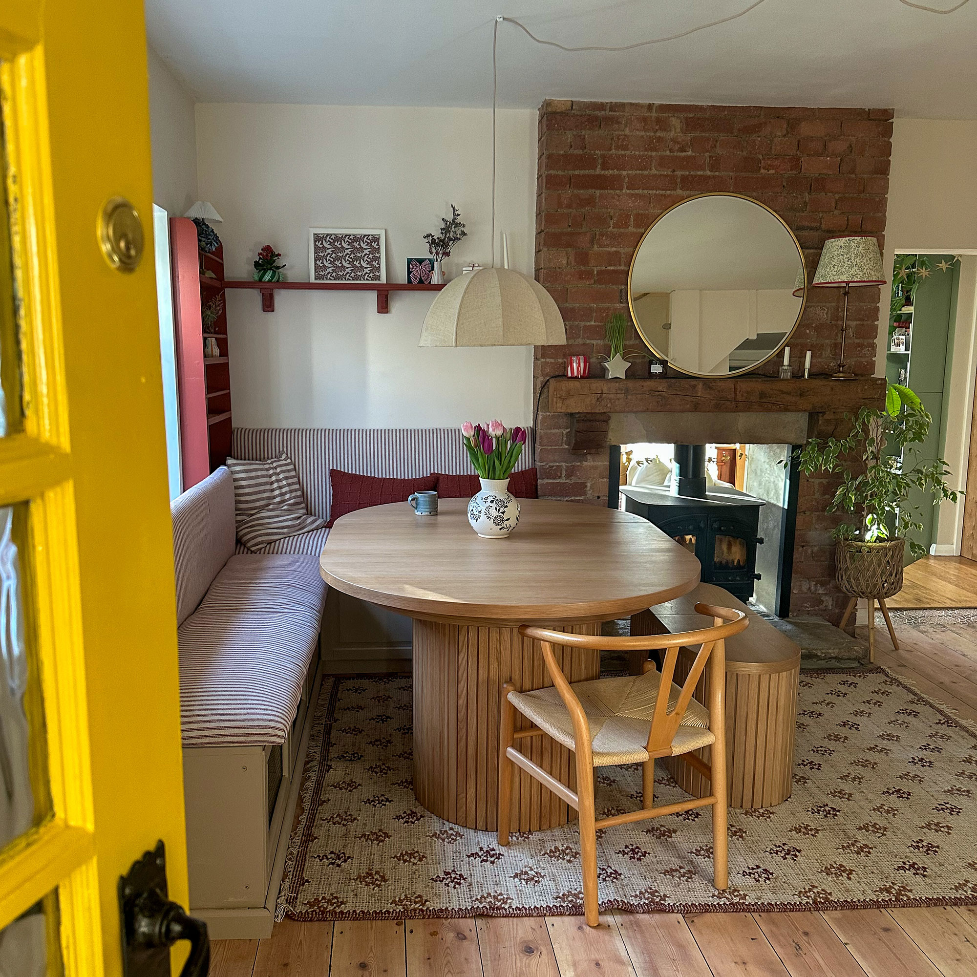 Kitchen-diner area with double sided wood burner