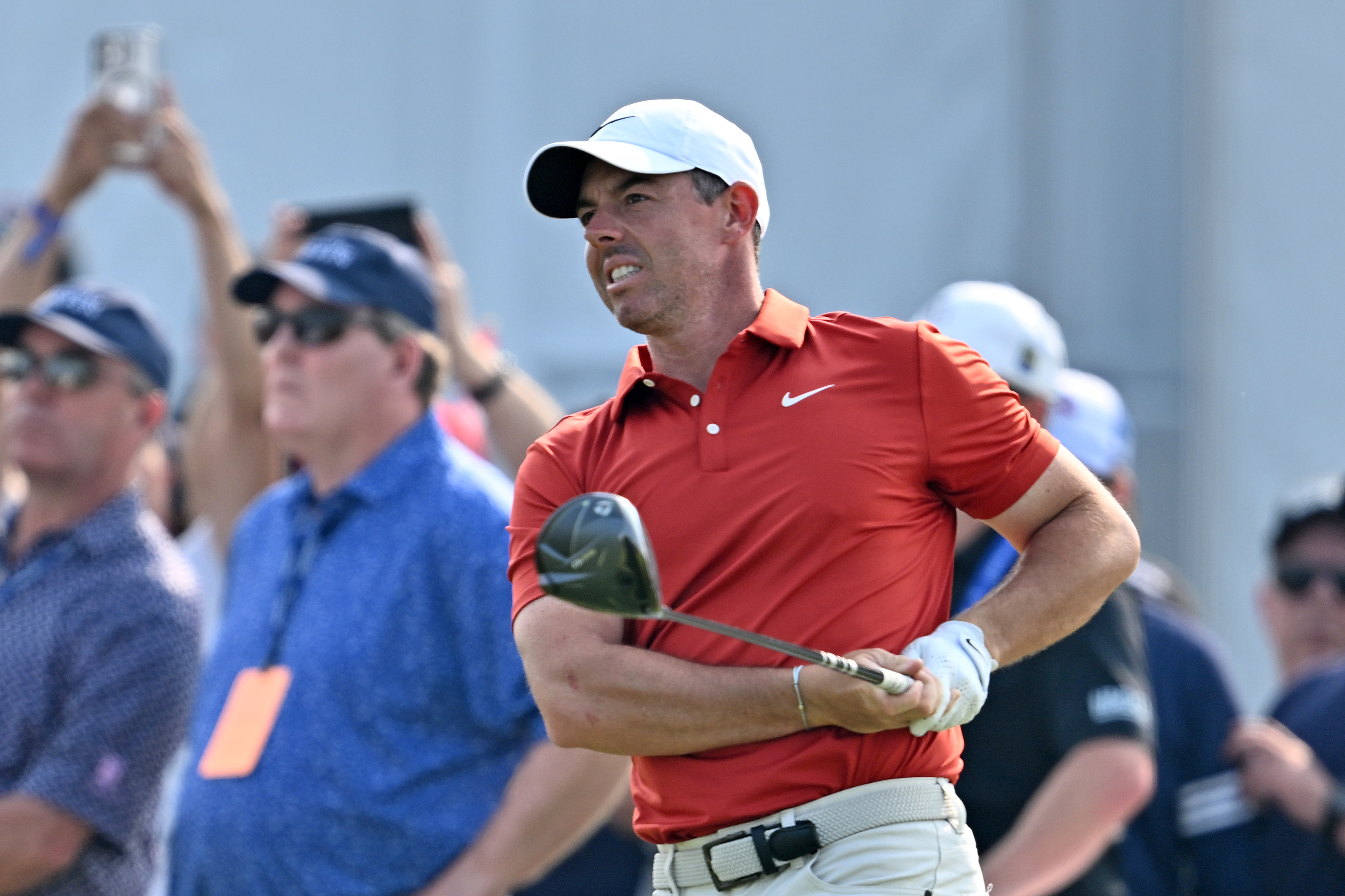 Rory McIlroy watches his tee shot after hitting a driver