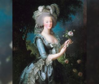 An oil painting by Elisabeth Vigee-Lebrun from 1783 shows Marie Antoinette with a rose, and it’s hanging in the Musée de l'Histoire de France, Versailles, France.