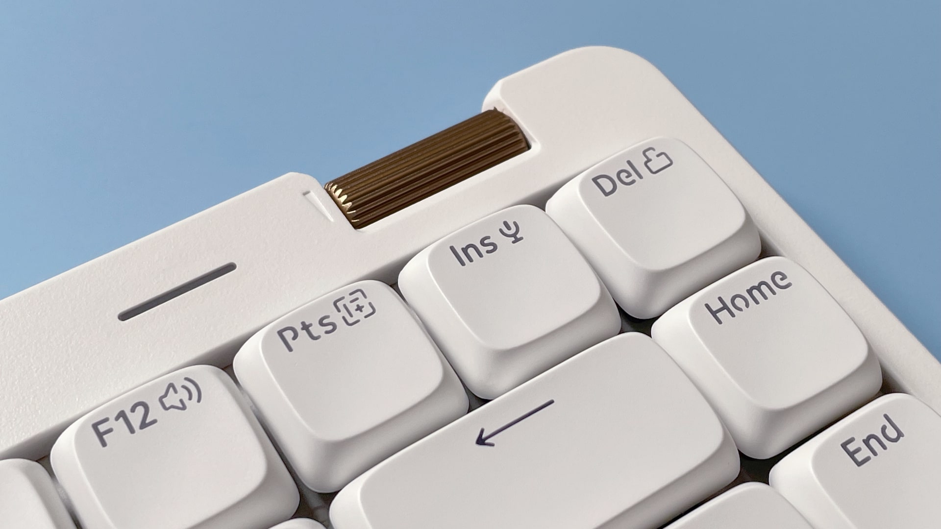 The Lofree Flow Lite mechanical keyboard against a blue background.