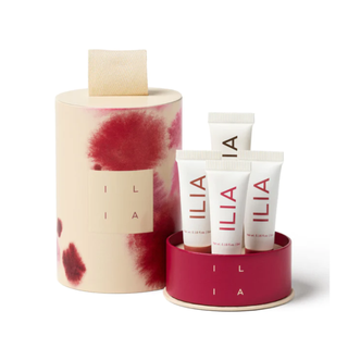 christmas gifts for her - ilia lip balm set in a round red and cream box