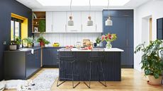 Blue kitchen with panelled island