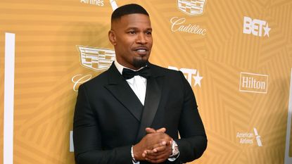 Jamie Foxx poses for the camera at an event
