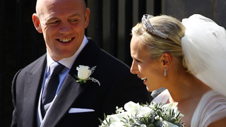 Mike Tindall and Zara Phillips depart after their Royal wedding at Canongate Kirk on July 30, 2011 in Edinburgh, Scotland