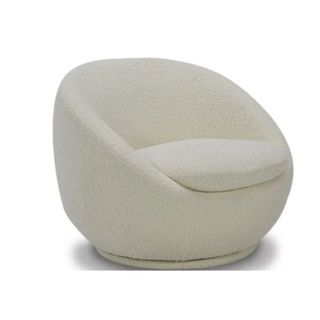 A swivel chair in cream