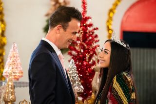 Freddie Prinze Jr. smiles at Aimee Garcia in 'Christmas With You'