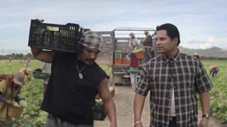 Bobby Soto and Michael Pena walking in the field in A Million Miles Away