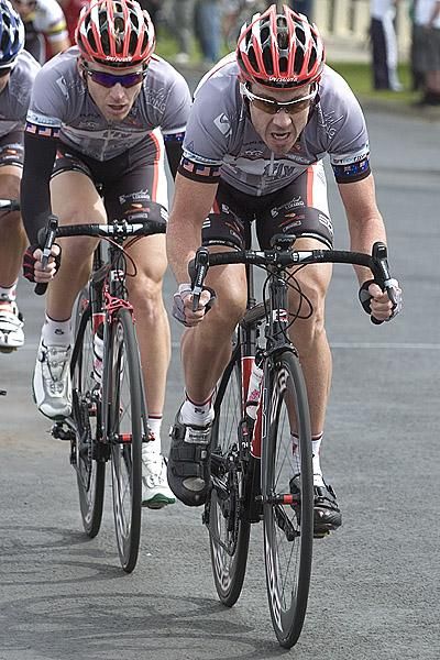 Ben Day leads his Fly V Australia teammate Phillip Zajicek on the front of the peloton in the final laps of the 30 lap criterium.