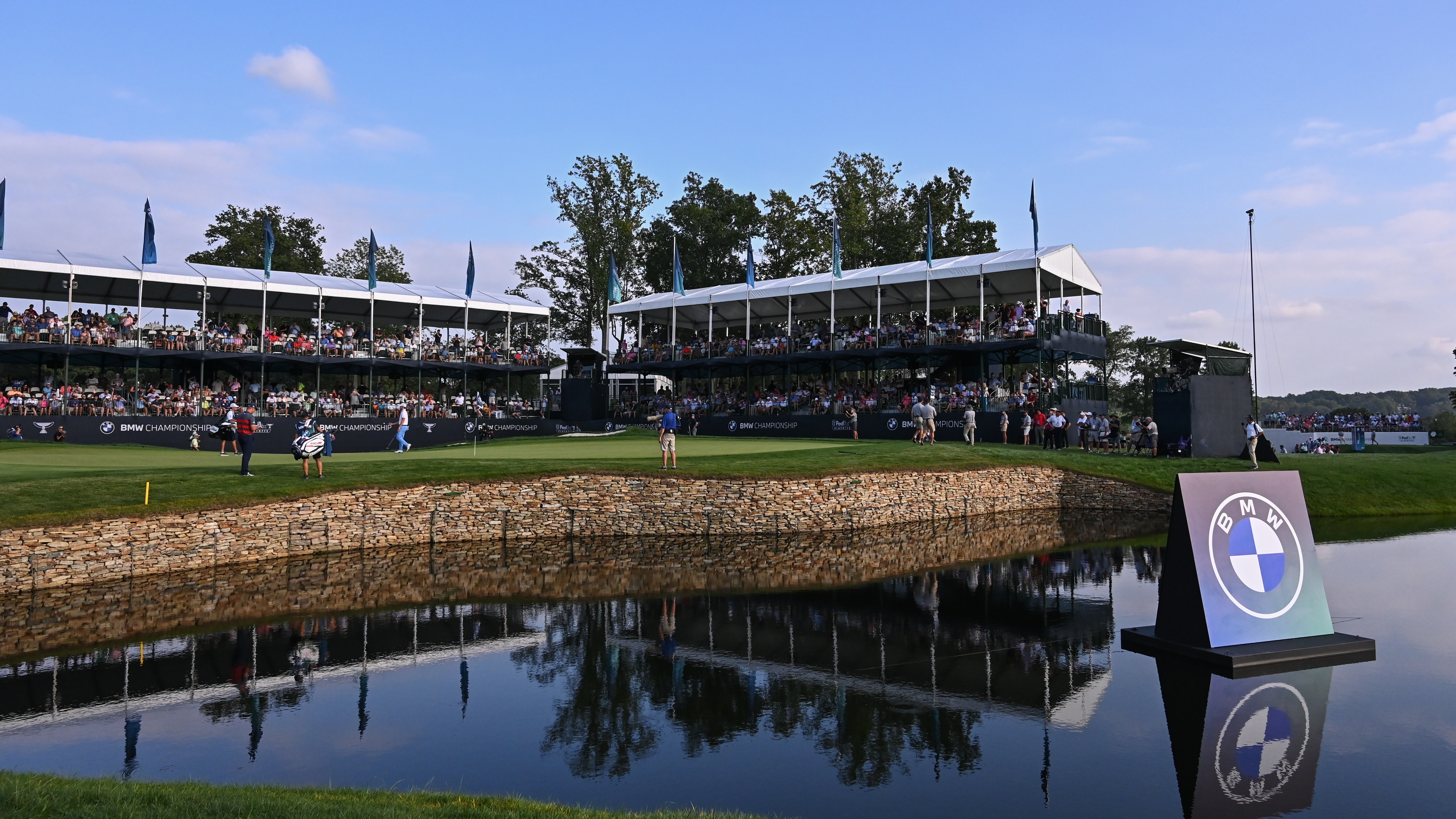 Patrick Cantlay and Bryson DeChambeau play the 17th green during the final round of the BMW Championship at Caves Valley Golf Club on August 29, 2021 in Owings Mills, Maryland. 