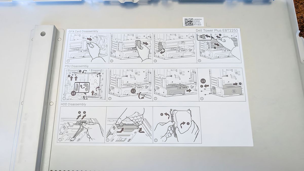 Illustrated instructions on the inside of the Dell Tower Plus EBT2250's side panel explaining how to open an disconnect various parts.