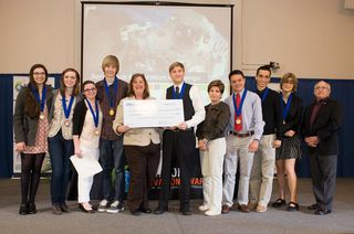 Each winning team at the Spirit of Innovation Challenge receives $5,000 to continue the development of their product. The four members of the Infinity team are on the left.