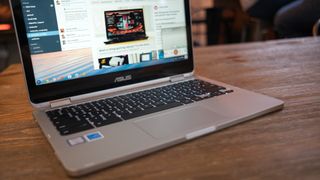 asus chromebook flip on a wooden table