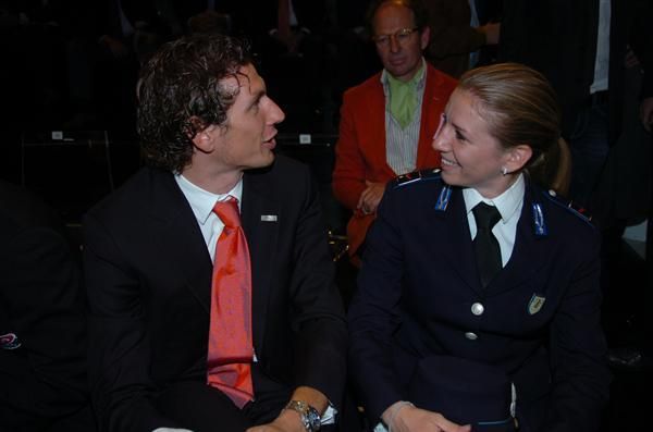 Filippo Pozzato sits next to World Champion Tatiana Guderzo