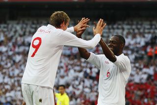 Ledley King (R) of England celebrates with team mate Peter Crouch (L) after scoring during the International Friendly match between England and Mexico at Wembley Stadium on May 24, 2010 in London, England.