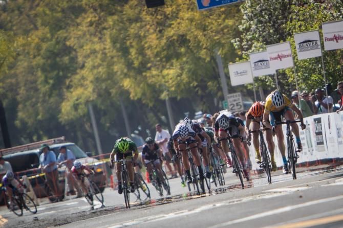 Alison Powers (Now and Novartis) leads the sprint from the final turn.