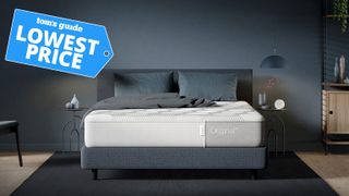 A Casper original mattress on a dark grey fabric bed base with a blue lowest price sale tag overlaid on the image