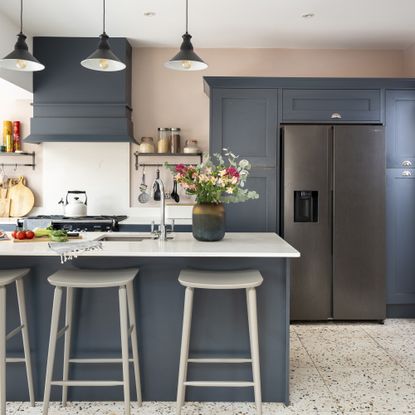 Navy open plan kitchen with island