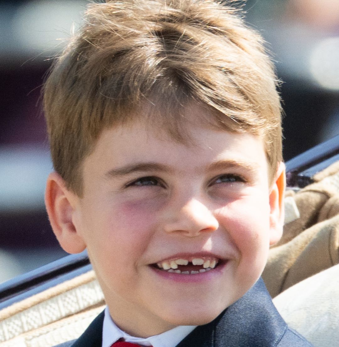 Prince Louis smiling in a carriage